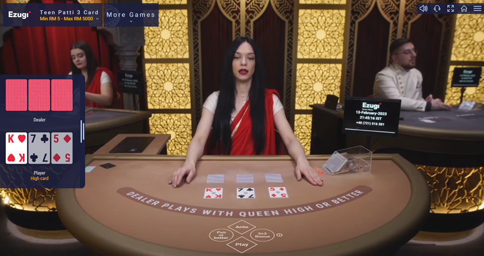 Dealer from Ezugi dealing card at Teen Patti 3 Card table